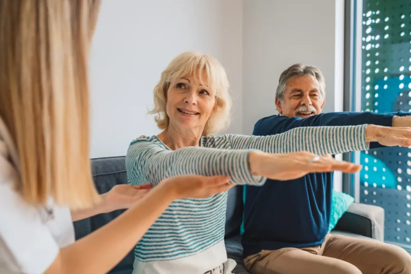 Physiotherapy 1 senior couple on physiotherapy session with home c 2023 02 22 21 51 56 utc